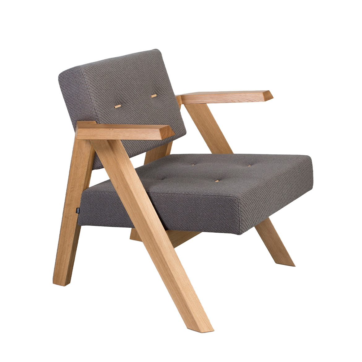Clapp is a furniture family comprising a sofa, an armchair, and tables in two sizes. Clapp armchair has solid oak wood base and seat + backrest upholstered with fabric or leather. Designed by Piotr Kuchciński.
